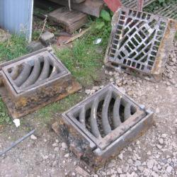 VARIOUS CAST IRON MANHOLES & GRIDS .