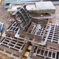 VARIOUS CAST IRON MANHOLES & GRIDS .