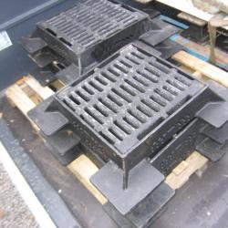 VARIOUS CAST IRON MANHOLES & GRIDS .