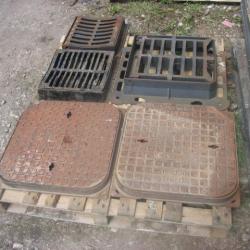 VARIOUS CAST IRON MANHOLES & GRIDS .