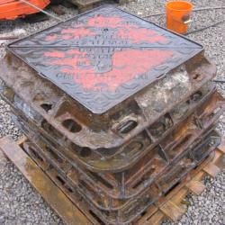 VARIOUS CAST IRON MANHOLES & GRIDS .